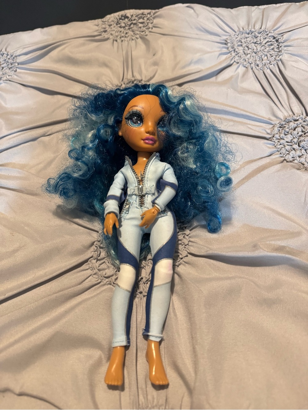 Blue Curly-Haired Fashion Doll in Light Blue Jumpsuit